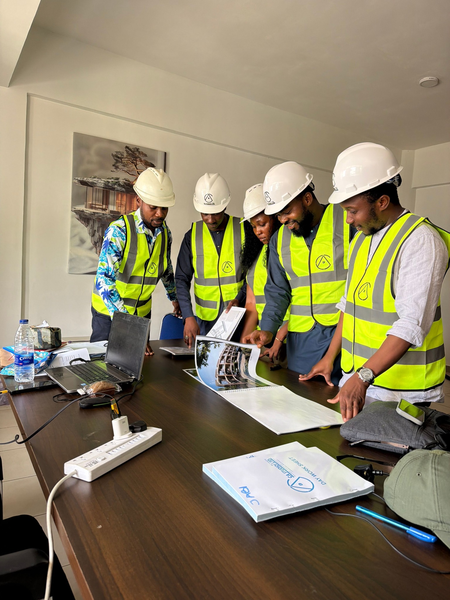 Rex Global engineering team reviewing a project